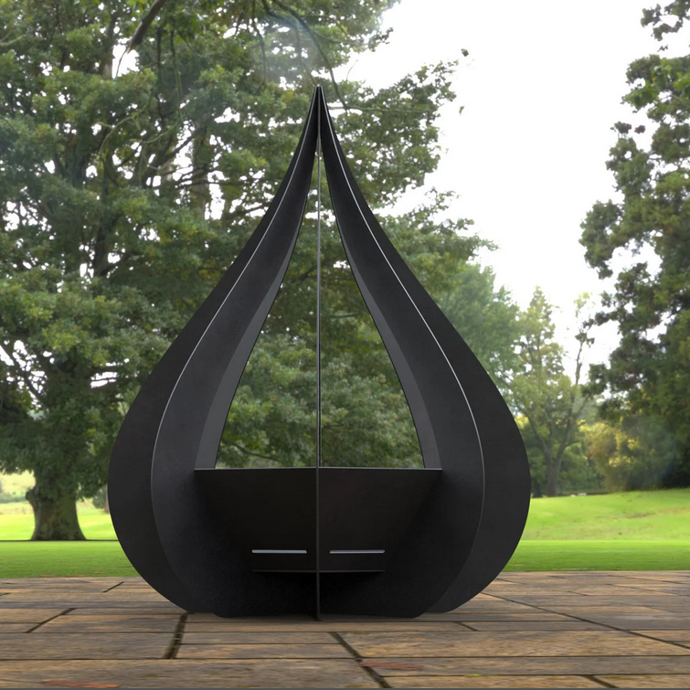 Modern black outdoor fire pit with trees in the background