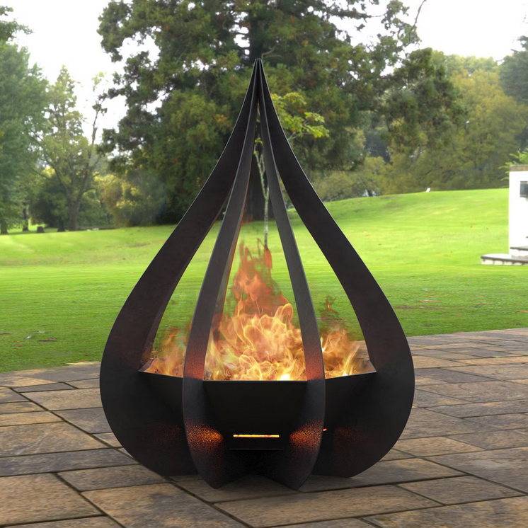 Modern outdoor fire pit with flames on a patio