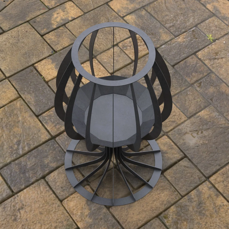 Metal fire pit on a paved patio